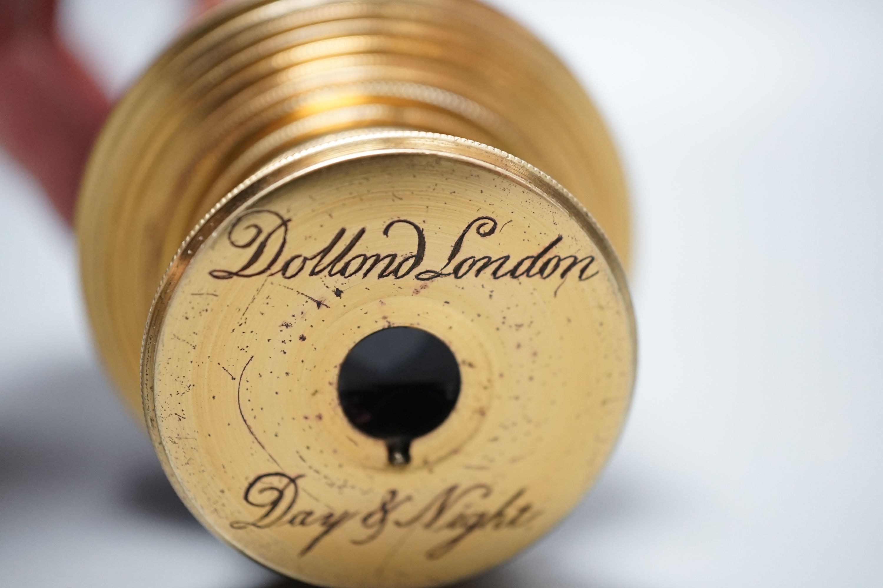 A Dolland Day or Night brass and leather nine draw telescope with case. Inscribed ‘Jas. Hy. Cottingham 1761 - 1819’